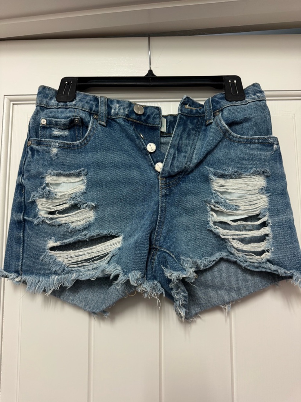 Women’s Distressed Blue Denim Jean Shorts with Frayed Hem